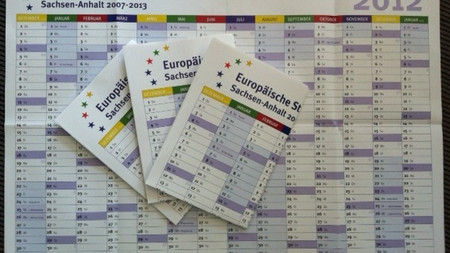 Das Bild zeigt einige Exemplare des Wandplaners 2012.