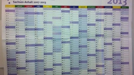 das Bild zeigt ein Exemplar des EU-Strukturfonds Wandplaners 2013.
